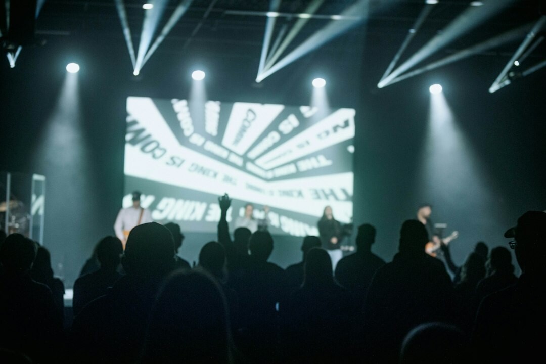 Award ceremony stage with spotlight and audience